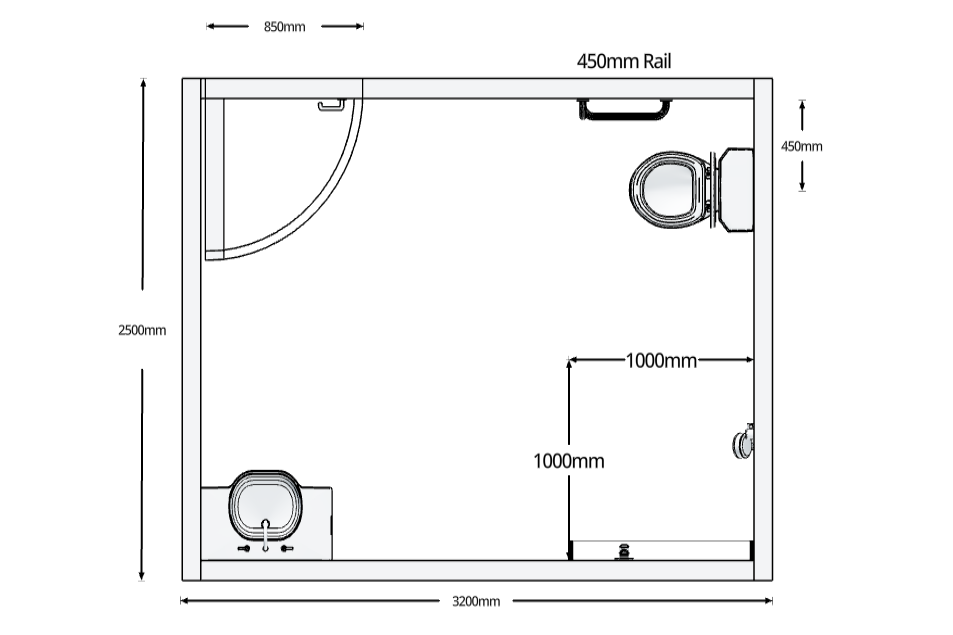 Top down view of a bathroom with a flat shower, toilet, handrail, door and vanity.