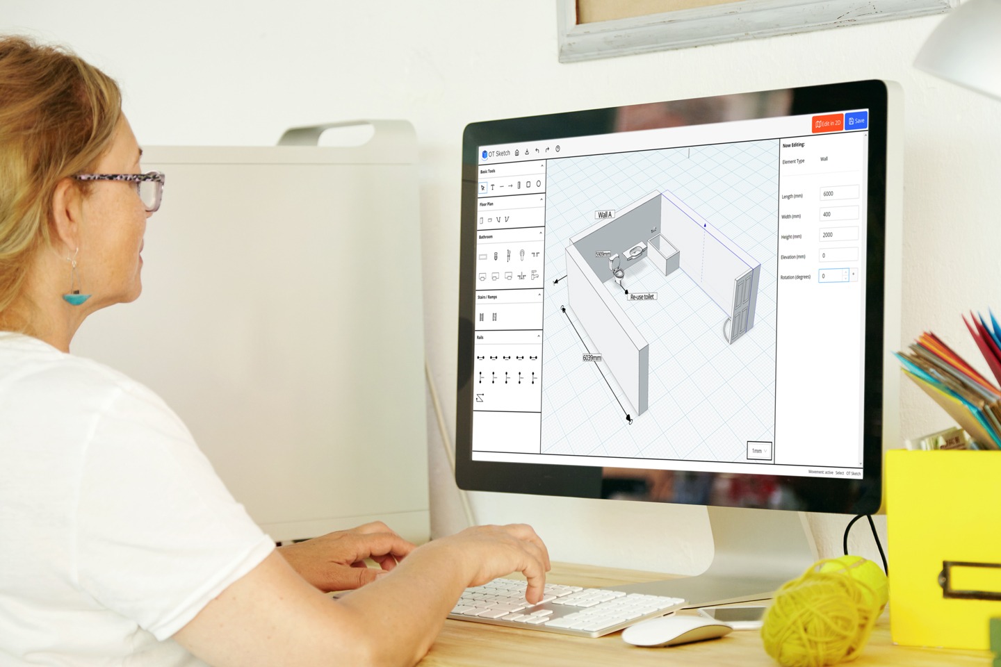 Rear view of an Occupational Therapist drawing an accessible athroom on OTSketch.com